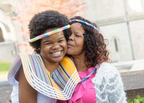 An international trinity college student with their family